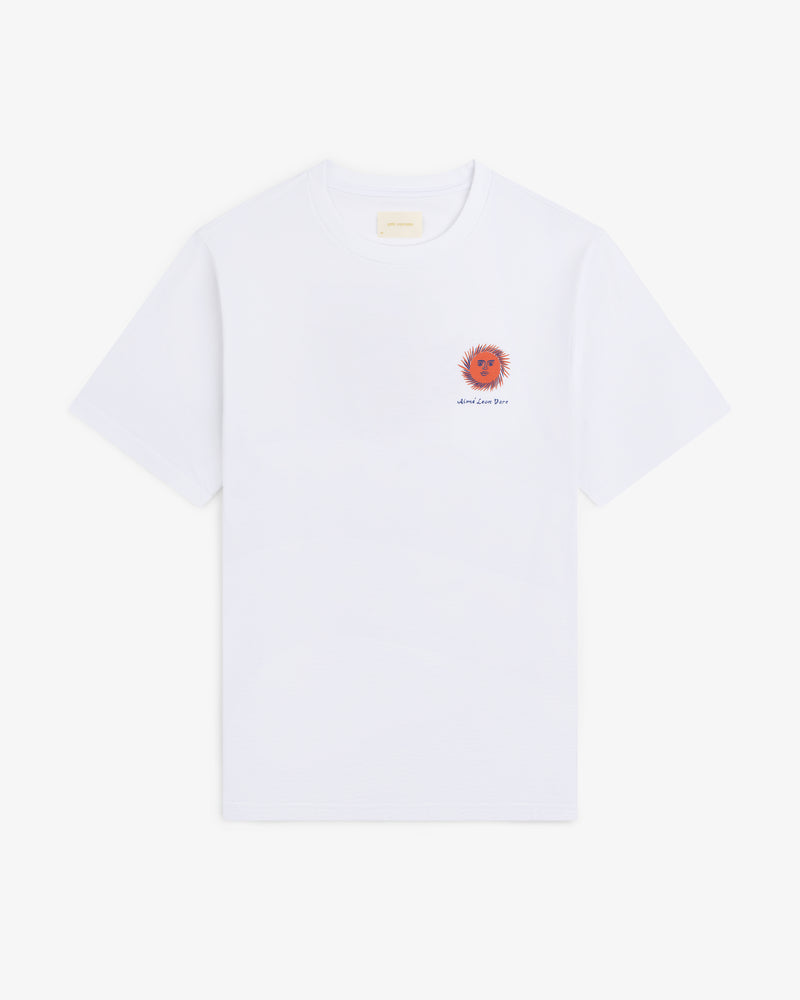 Fassianos "Sovereign Sun" Tee: white shirt with small orange sun and text on left chest, shown on plain background.