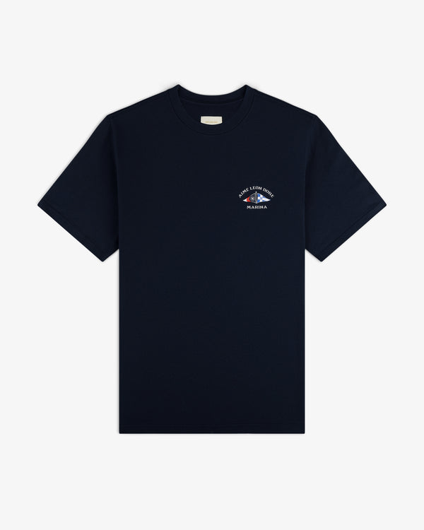 Marina Tee: Navy blue short-sleeve t-shirt with a small white logo and text on the left chest.