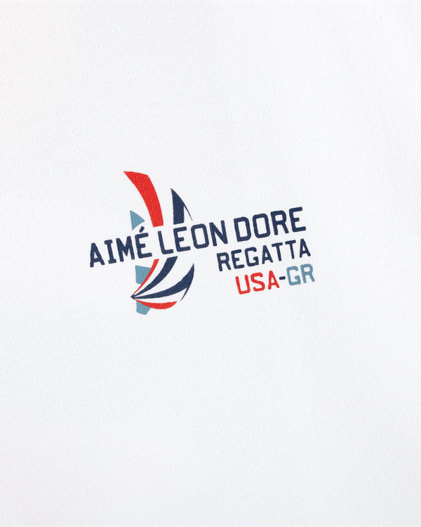 The Regatta Tee features "AIMÉ LEON DORE REGATTA USA-GR" and a red, blue, gray sailboat on white fabric.