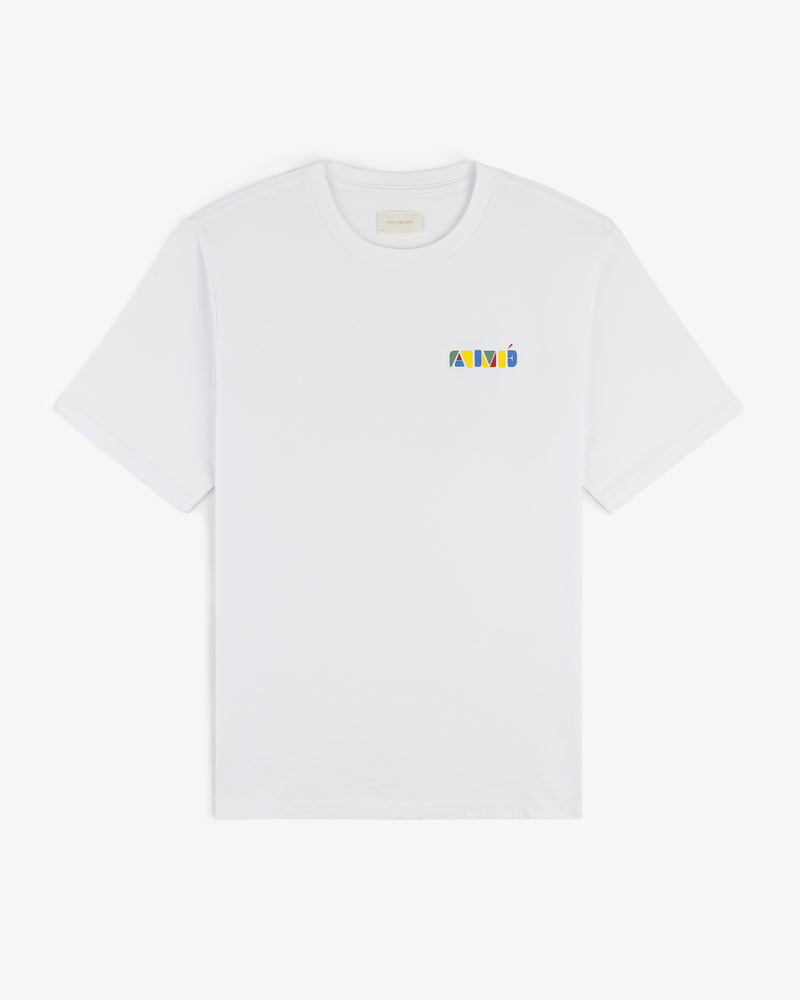 Stacked Logo Tee: White T-shirt featuring a small, colorful geometric logo on the left chest.