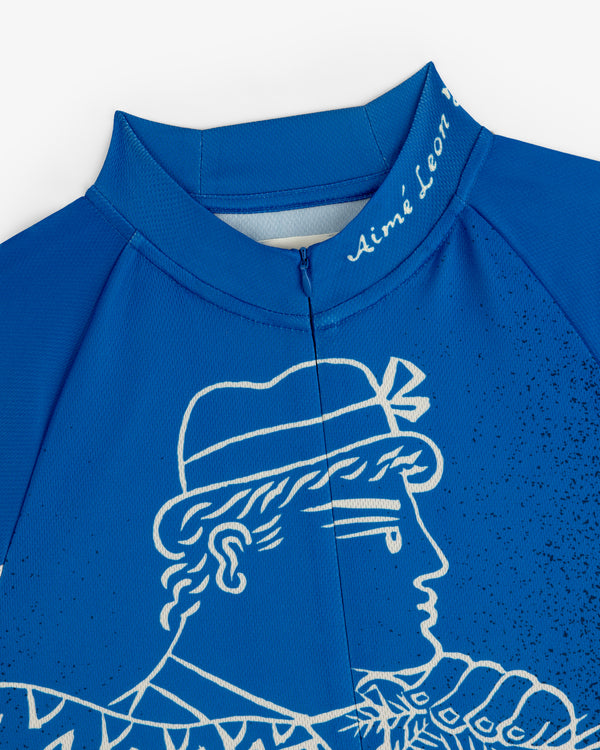 Close-up of the Fassianos Half-Zip Cycling Jersey in blue, featuring a white profile drawing and Aimé Leon on the collar.