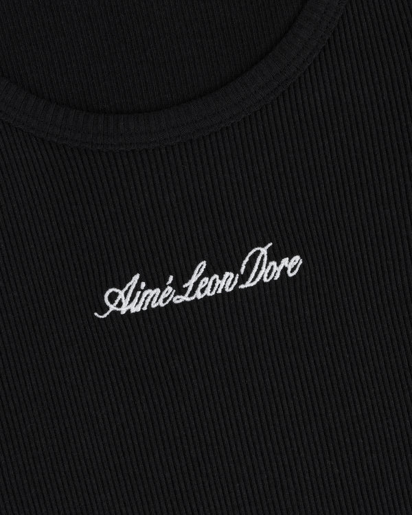 Close-up of black ribbed Embroidered Logo Tank Top with “Aimé Leon Dore” in white cursive embroidery.