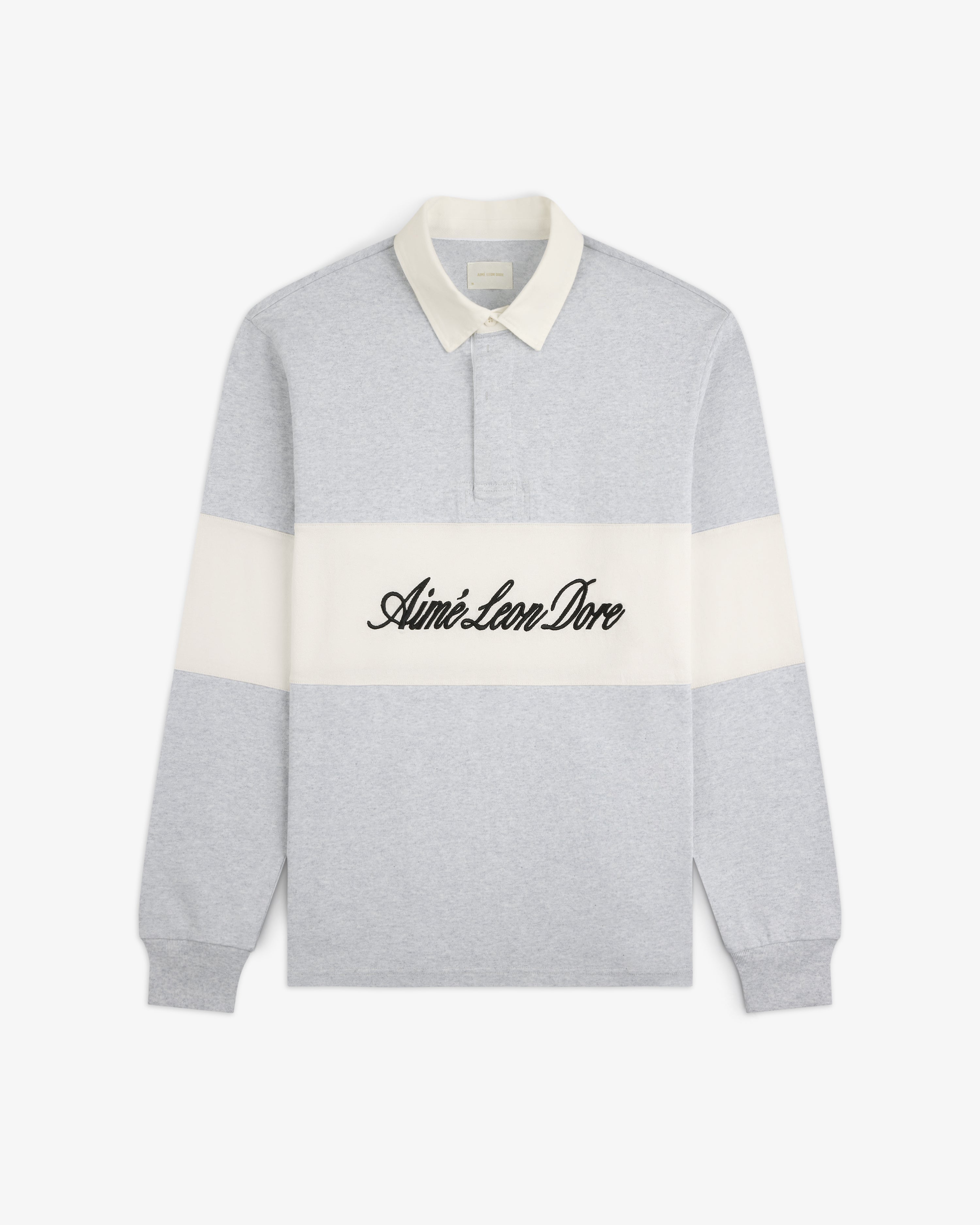 Light gray Script Paneled Rugby with white collar and stripe, featuring Aimé Leon Dore text across the chest.