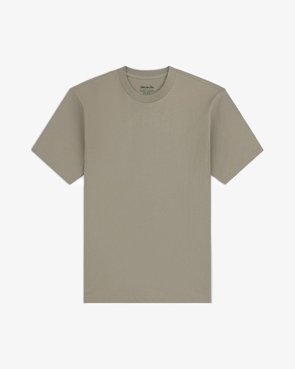 A pack of three multi-color t-shirts, short-sleeve, laid flat on a white background.