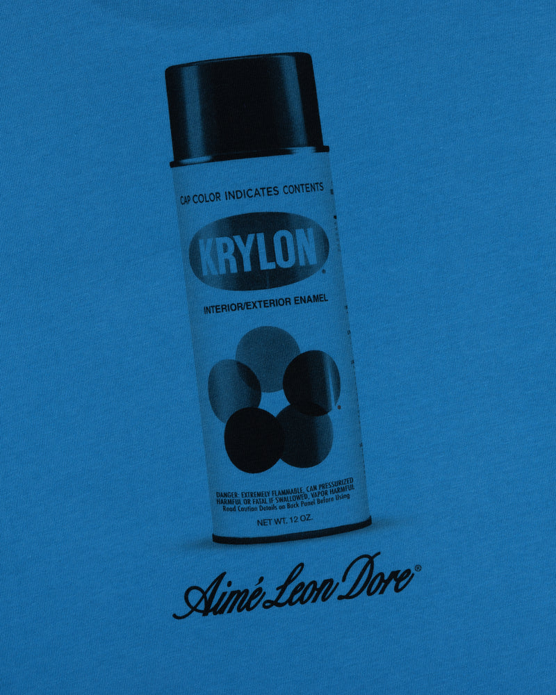 A graphic of the Krylon Pocket Tee with Aimé Leon Dore text on a blue background.
