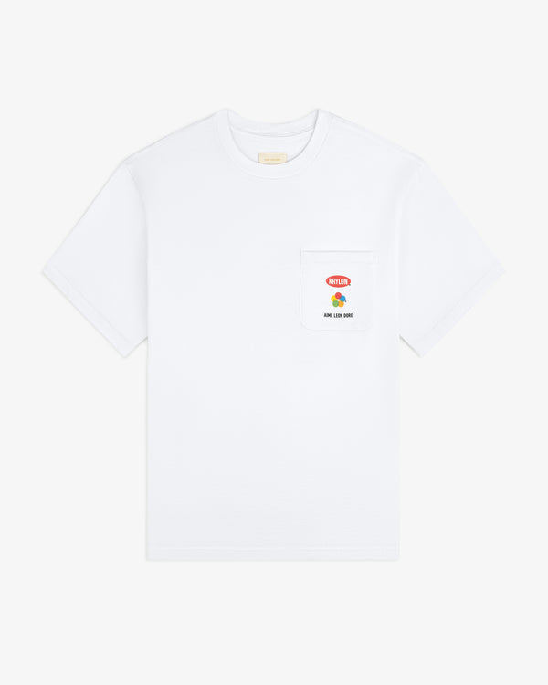 Krylon Pocket Tee: White short-sleeve shirt with a chest pocket, small red & yellow graphic, and text.