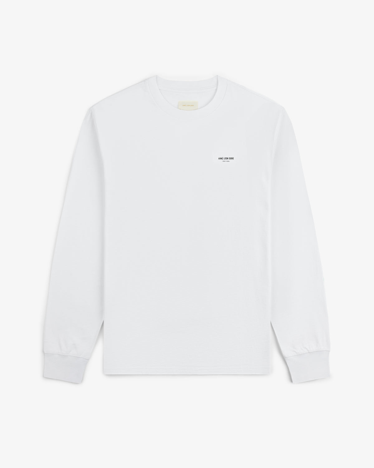 Long-Sleeve Micro Logo Tee in white with small black left-chest text, shown flat on a white background.