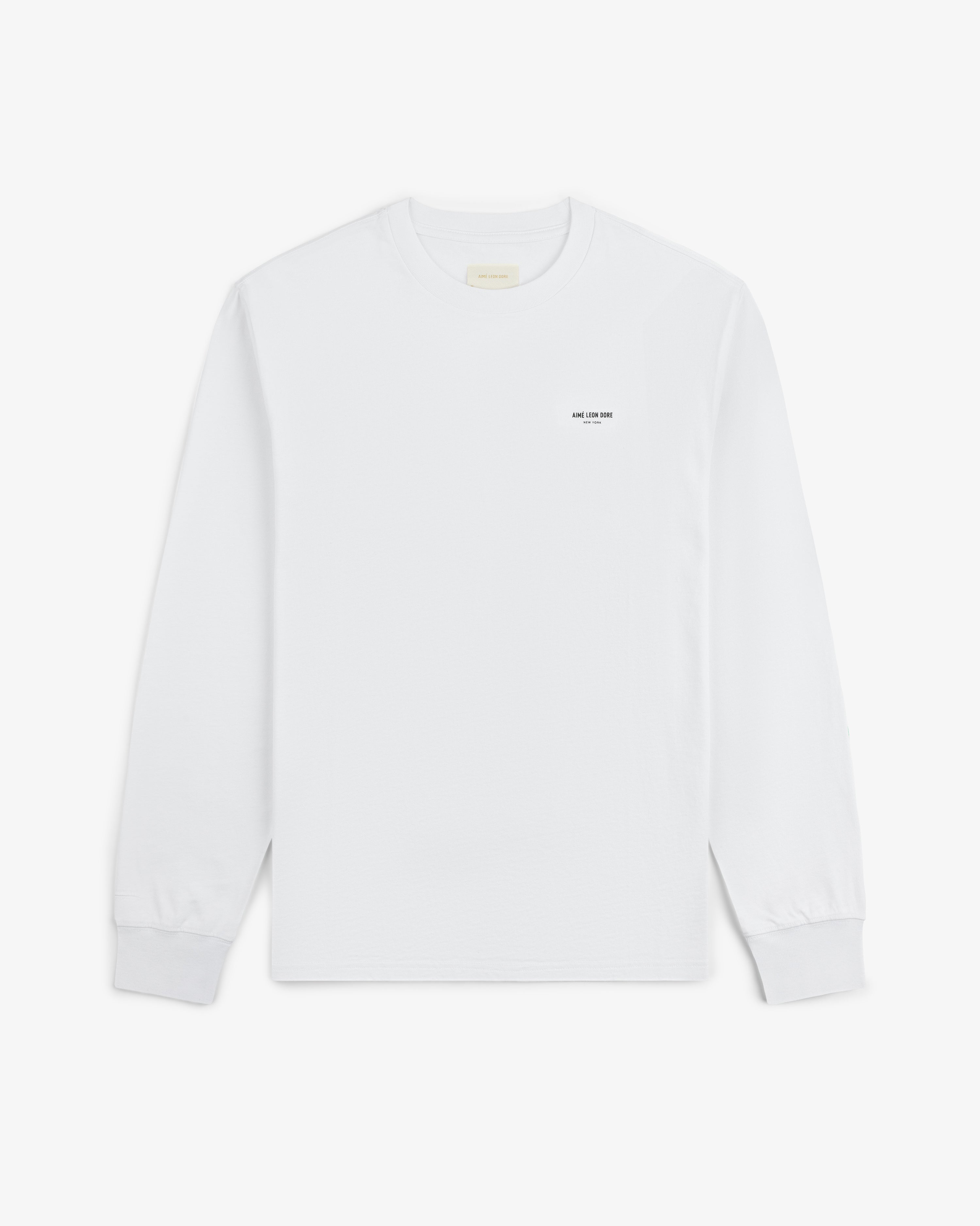 Long-Sleeve Micro Logo Tee in white with small black left-chest text, shown flat on a white background.