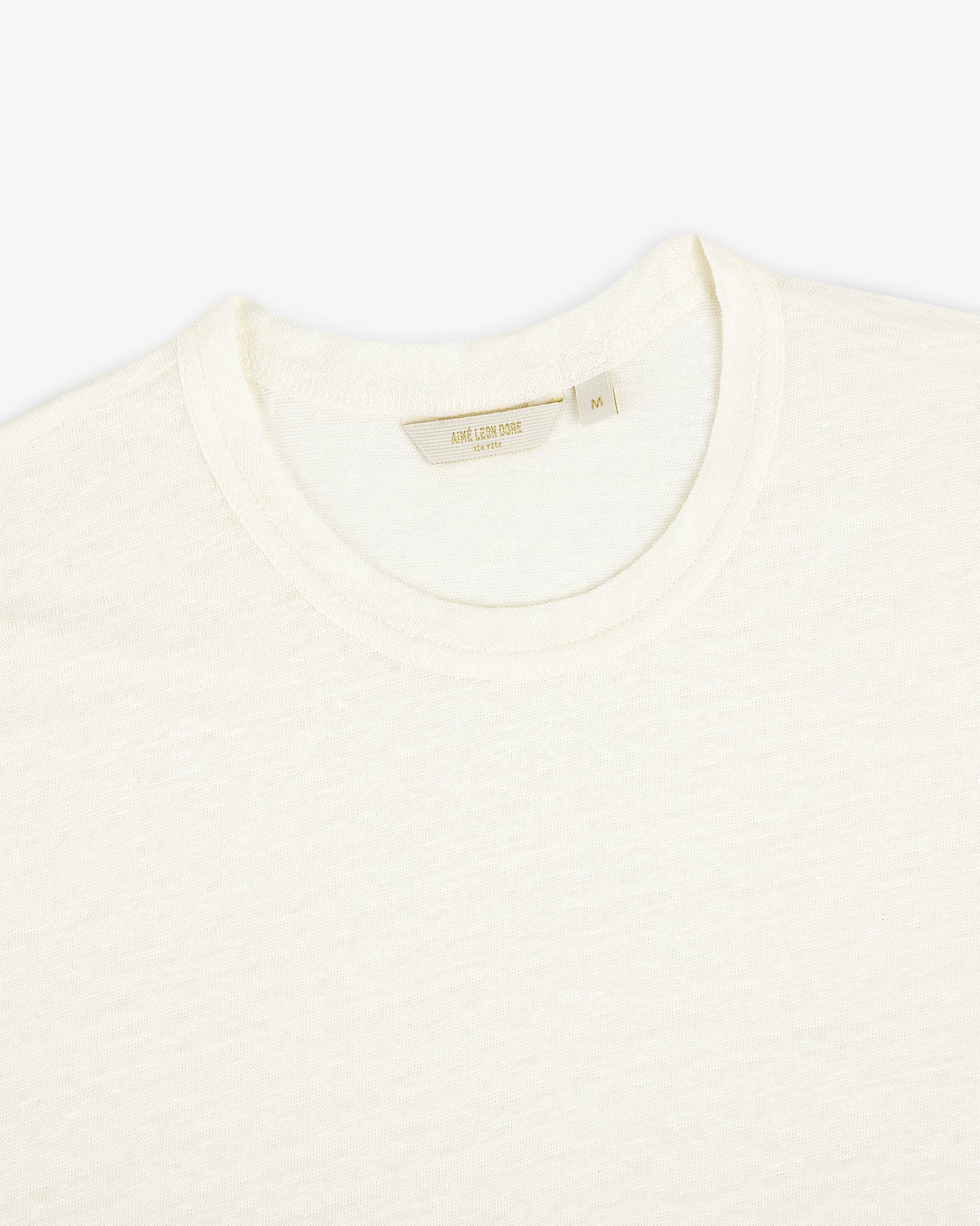 Linen Tee in off-white, size medium, laid flat on a white background.