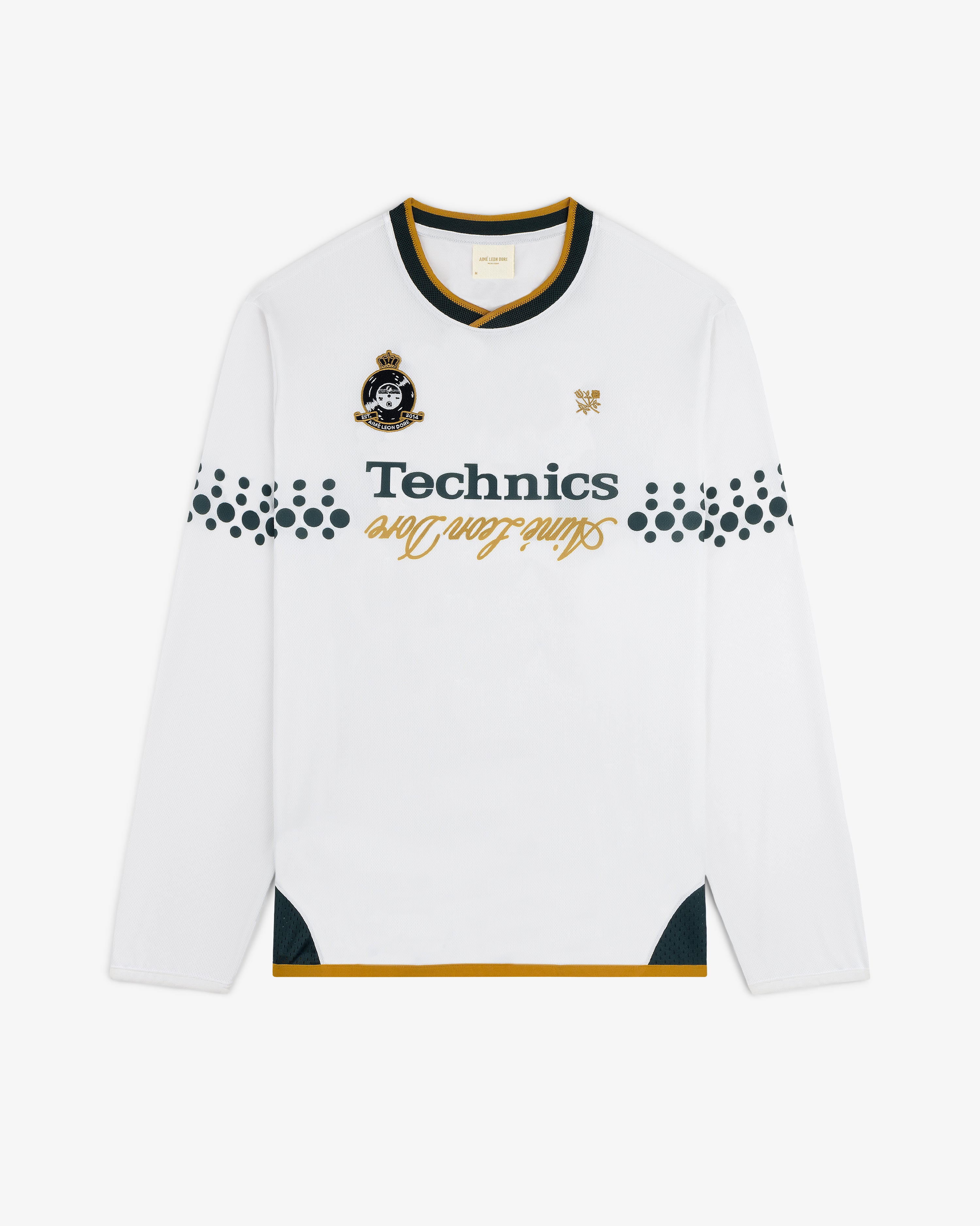 ALD / Technics Soccer Jersey: white long-sleeve with black & gold details, Technics text, and left chest crest.