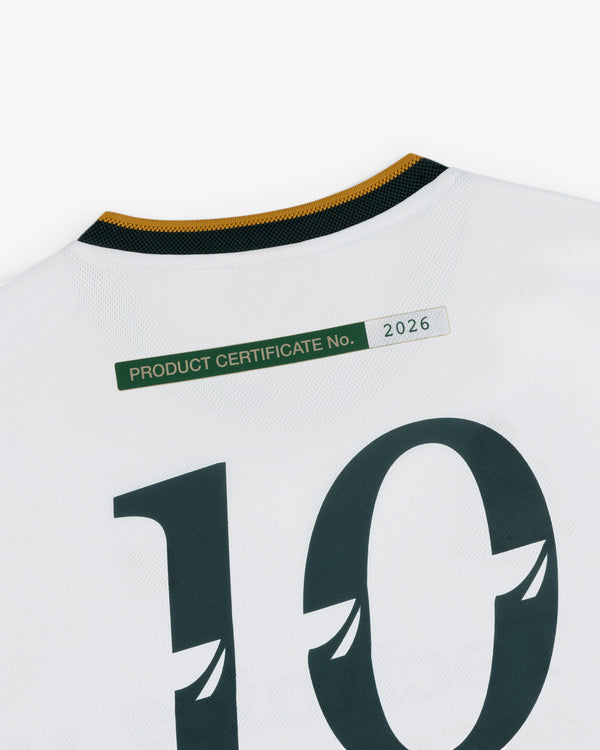 Back of an ALD / Technics Soccer Jersey, white with green number 10 and PRODUCT CERTIFICATE No. 2026 label.