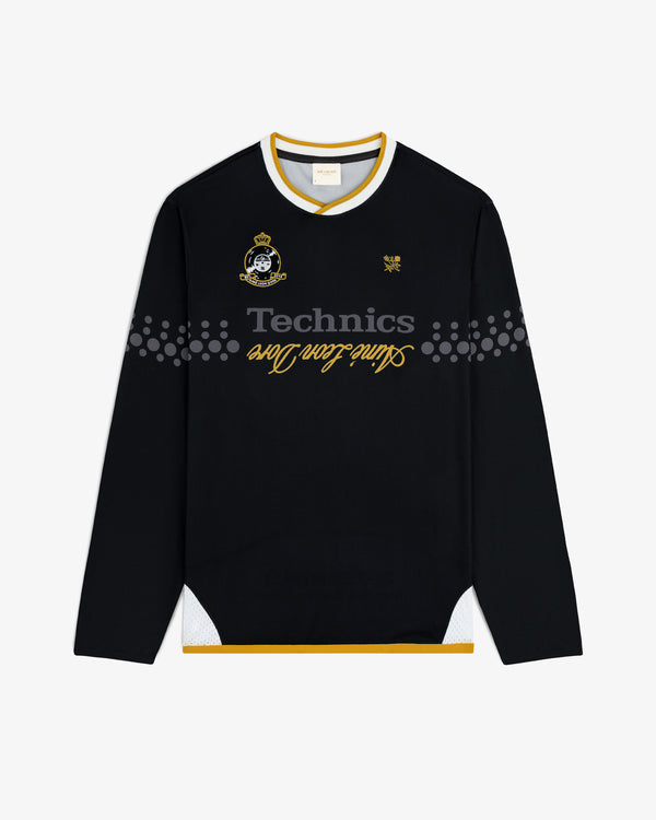 ALD / Technics Soccer Jersey: Black long-sleeve with yellow, white accents, logo, and front graphics.