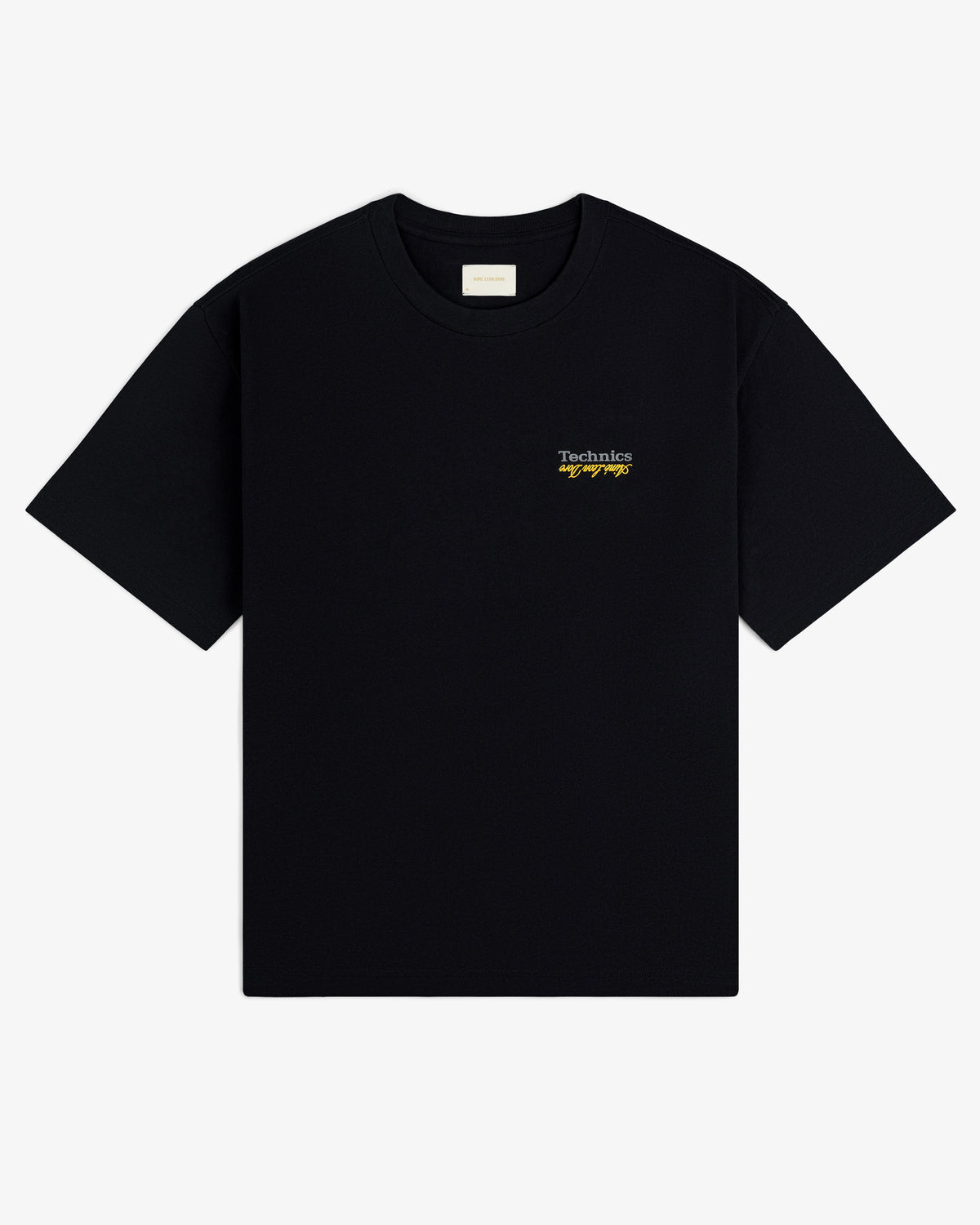 ALD / Technics Logo Tee: Black with small white and yellow "Technics by Design" text on the upper left chest.