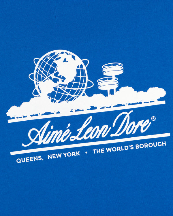 White graphic on blue tee with globe, observatory, trees, and text: ALD / LA Dodgers Unisphere Tee.
