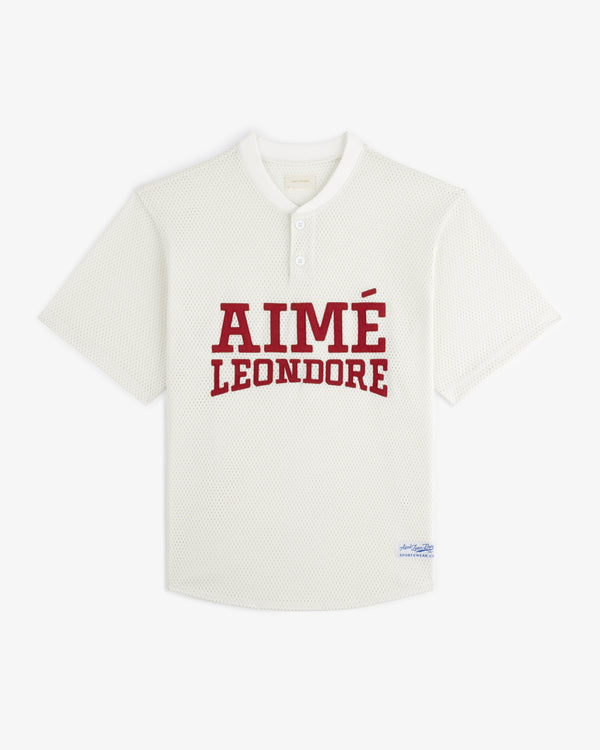 White short-sleeve Mesh Batting Practice Jersey with bold red AIMÉ LEON DORE front text and blue hem label.