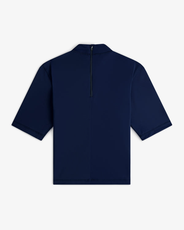 Short Sleeve Crest Rash Guard in navy blue, shown from the back with a black vertical zipper at the neck.