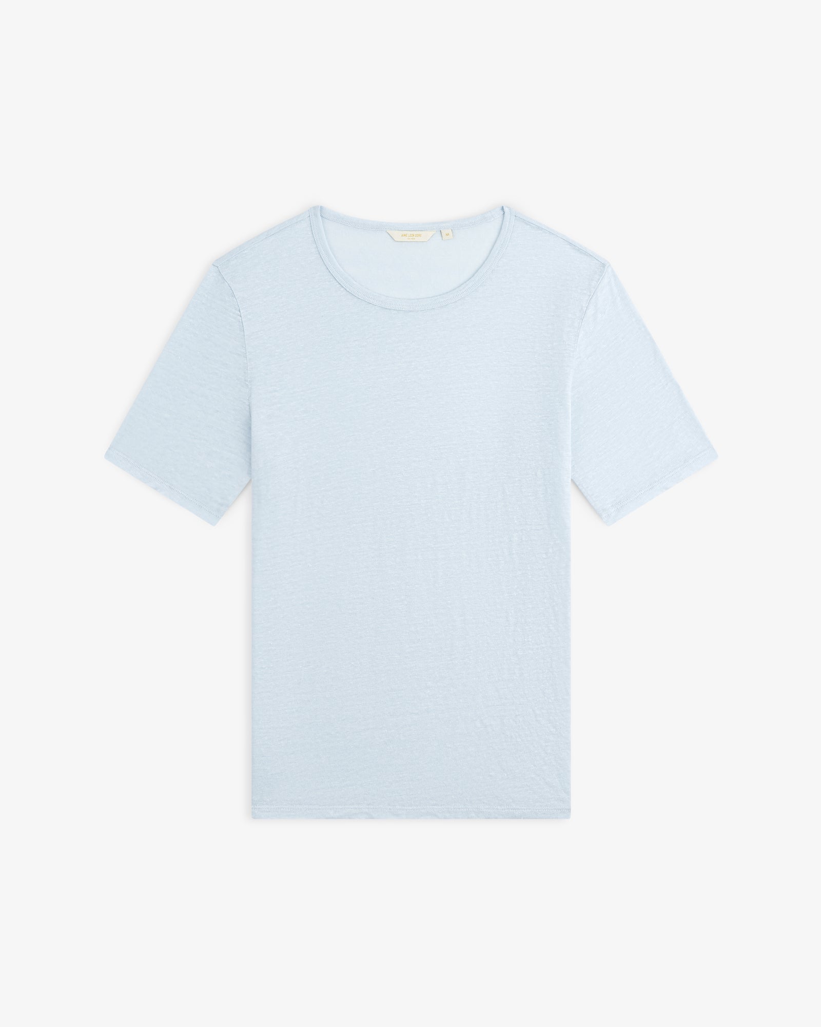 Linen Tee in light blue with short sleeves, laid flat on a white background.
