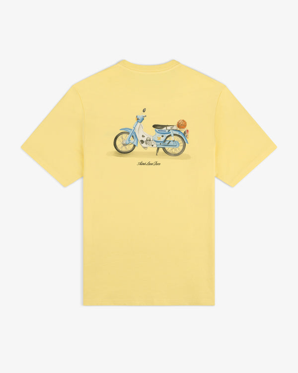 Super Cub Tee: Yellow t-shirt with a blue vintage scooter graphic, basket on back, and “Slow Low Sun” text.