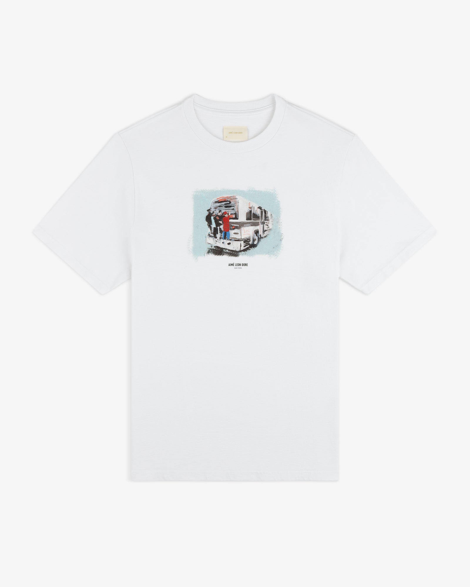 Mesaikos Commuter Tee: white T-shirt with a small illustrated graphic of a truck and people on the chest.