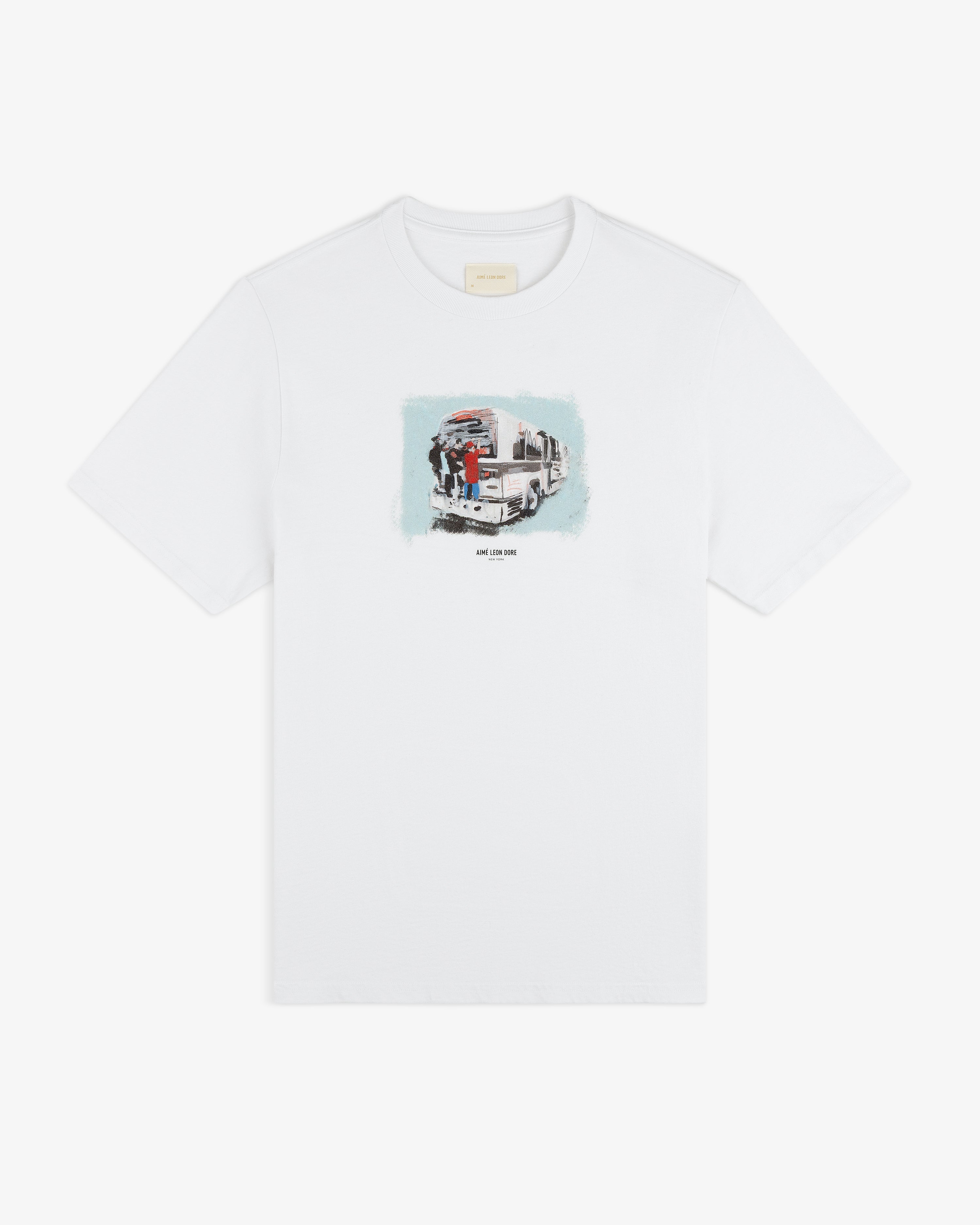 Mesaikos Commuter Tee: white T-shirt with a small illustrated graphic of a truck and people on the chest.