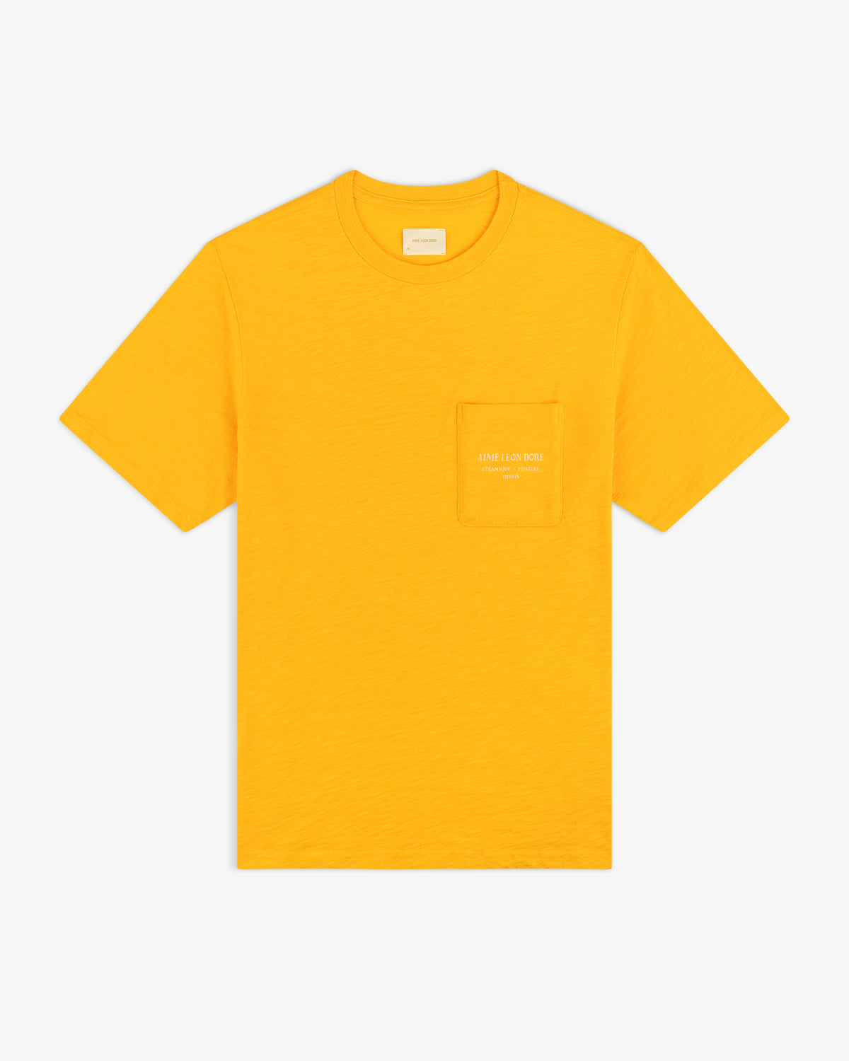 Artiste Pocket Tee: bright yellow short-sleeve shirt with chest pocket and subtle logo text on the pocket.