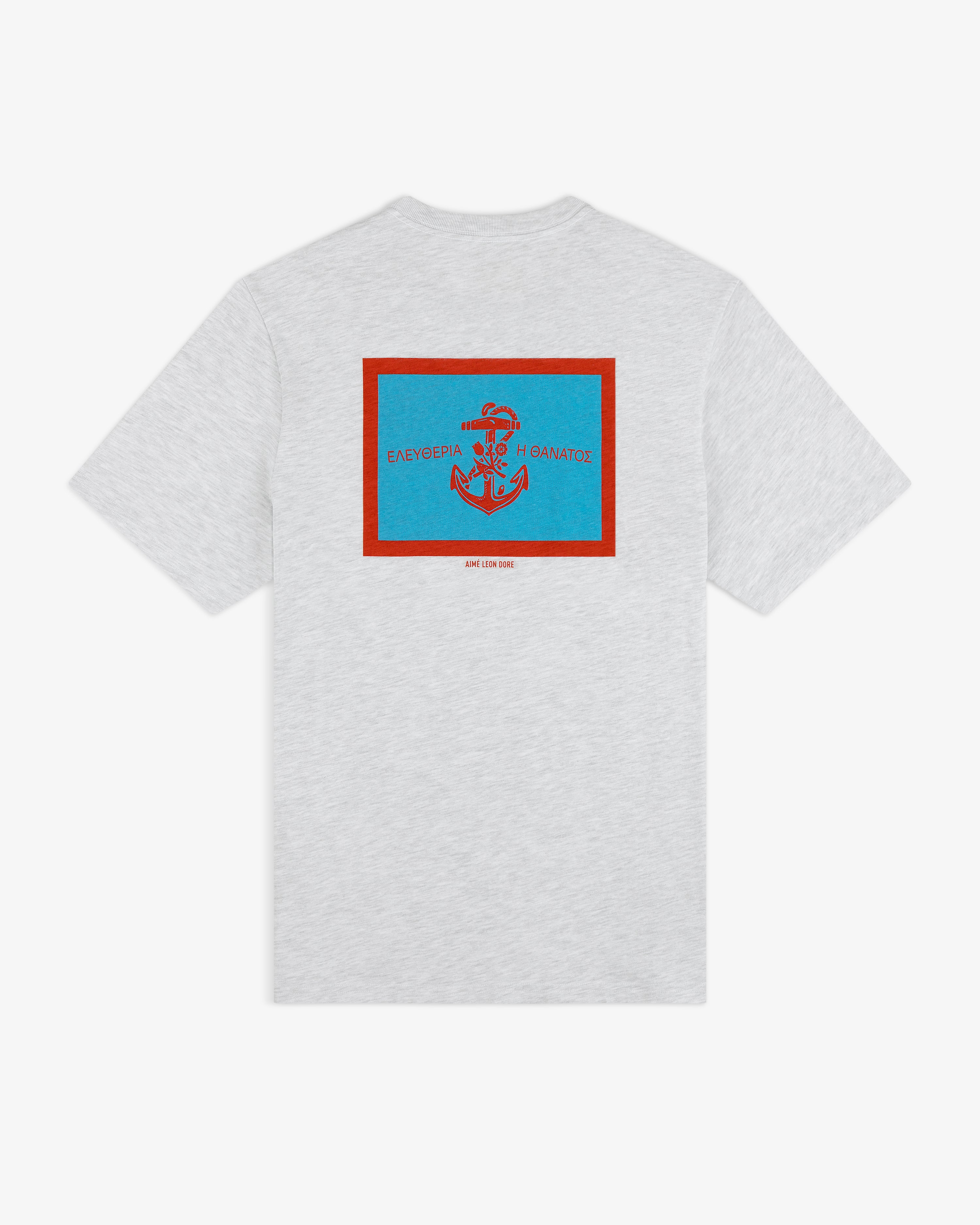 Coastal Flag Tee: Light gray shirt with blue/red anchor and Greek text on back, outlined by a red rectangle.