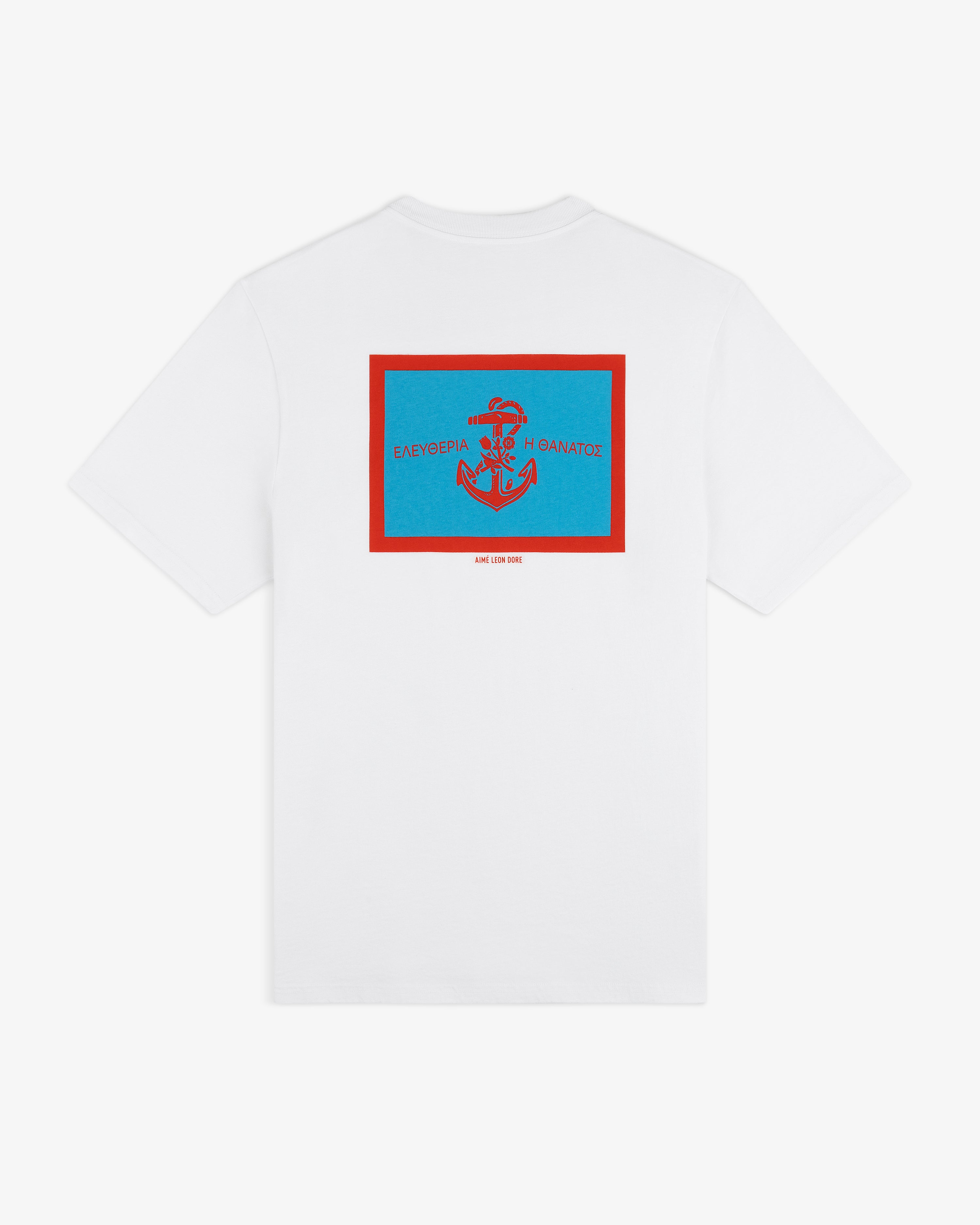 Coastal Flag Tee: White shirt with red-bordered blue rectangle and Greek text above an anchor graphic on the back.