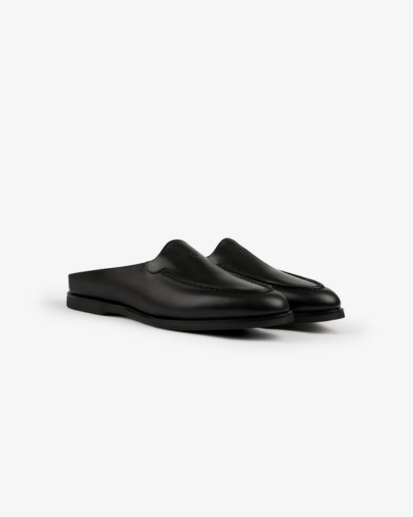 Venetian Mule black leather backless slip-on loafers with low heels, displayed on a plain white background.