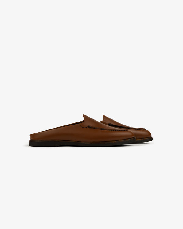 Venetian Mule brown leather slip-on loafers with black soles, side view on a white background.
