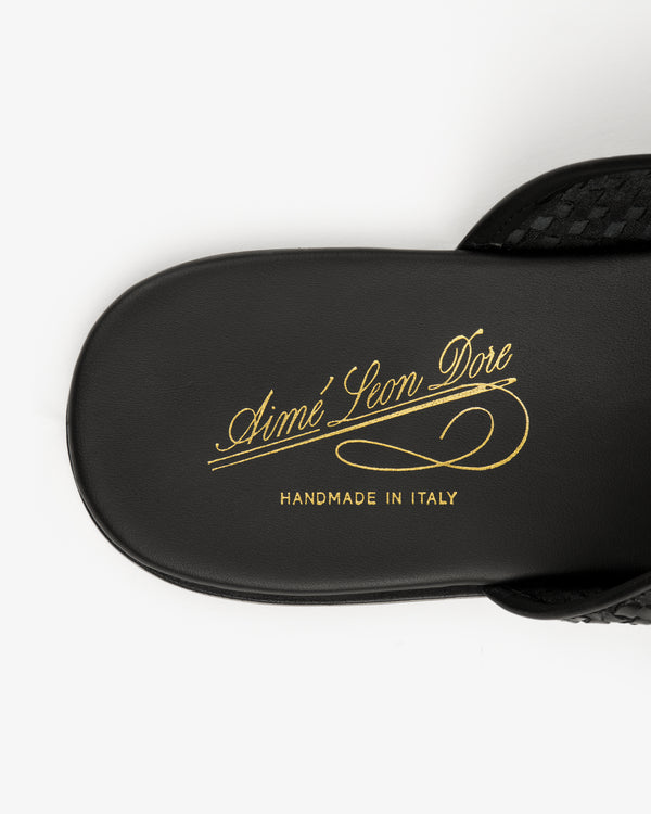 Top view of the Leather Raffia Mule with "Aimé Leon Dore Handmade in Italy" in gold script on the insole.