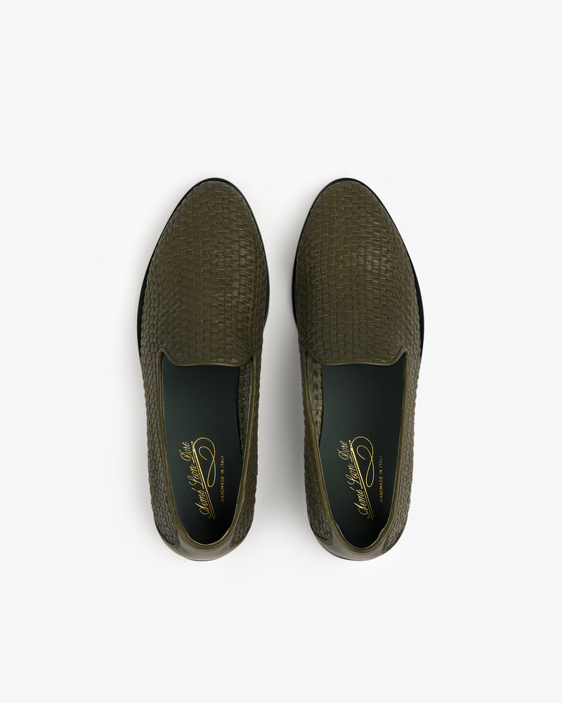 Top view of a pair of Leather Raffia Loafers in olive green with woven texture and dark green insoles.