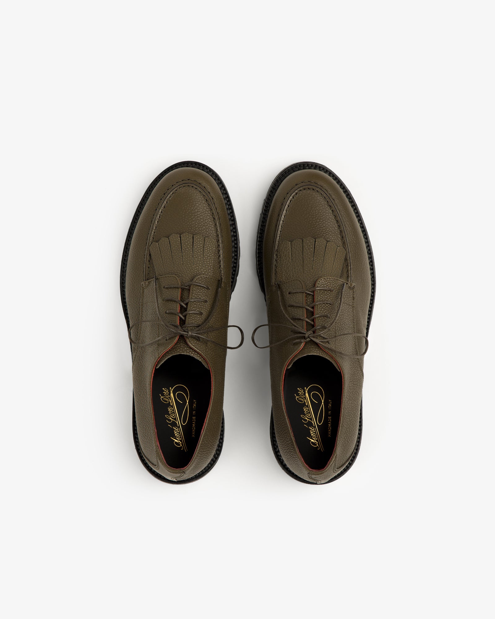 Olive green Leather Lug Sole Derby shoes with laces, viewed from above on a white background.