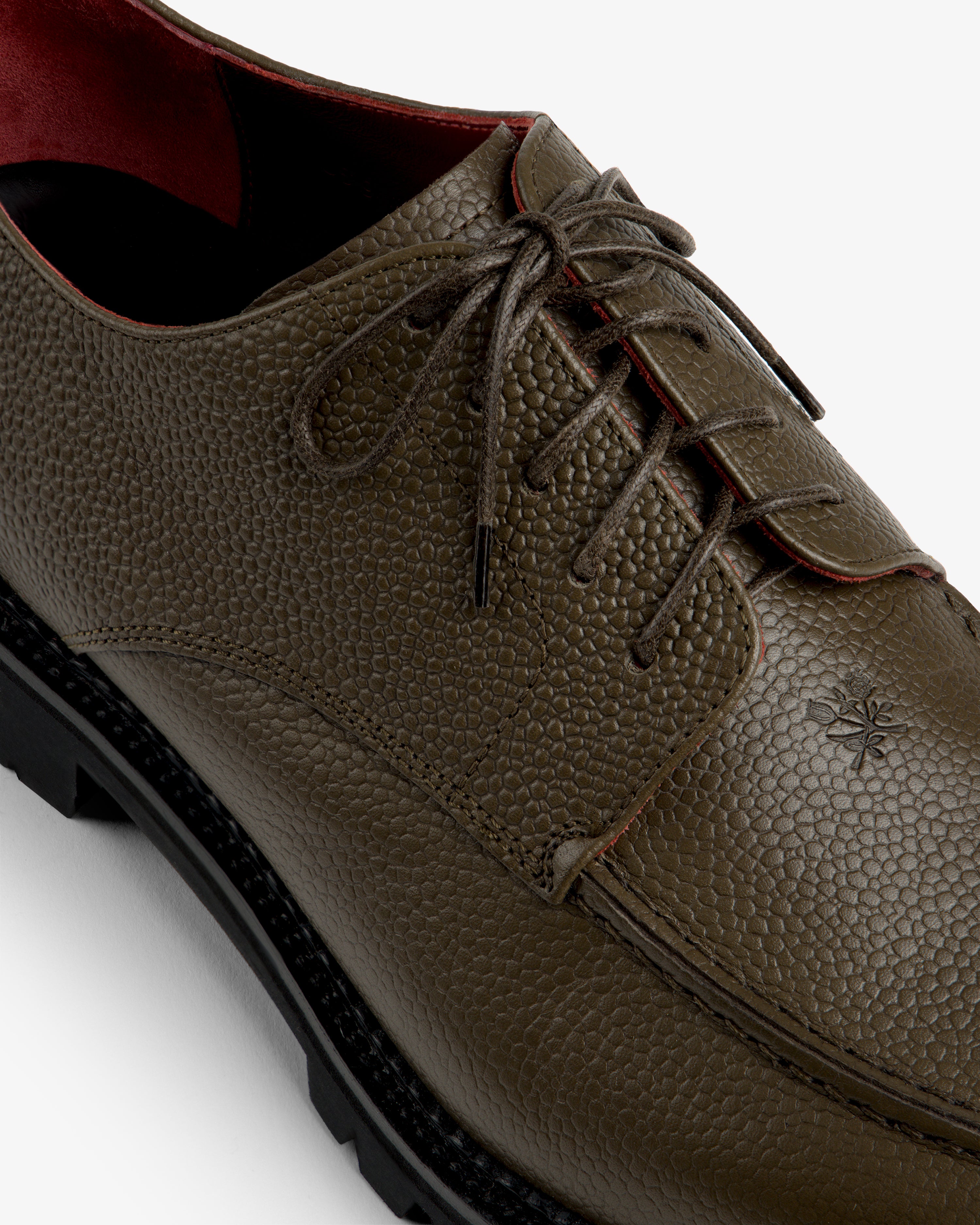 Olive green textured Leather Lug Sole Derby with matching laces and a thick black lug sole.