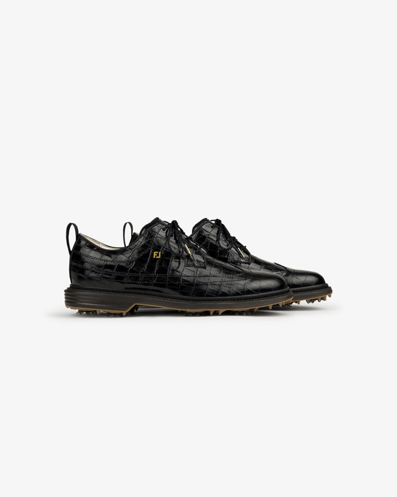 ALD / Footjoy Croc-Embossed Premiere Series Marquis black leather dress shoes with lace-up fronts and brown soles.