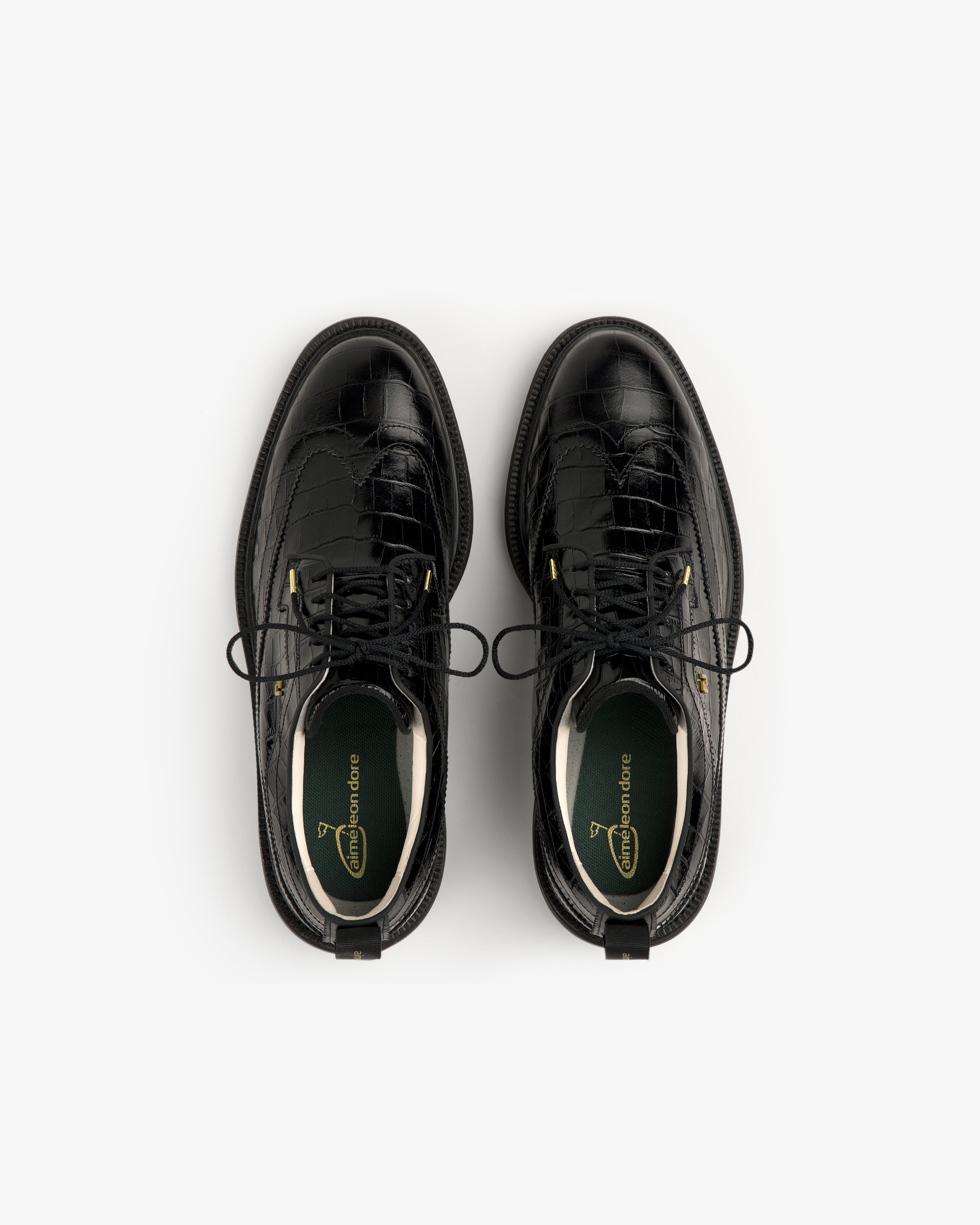 ALD / Footjoy Croc-Embossed Premiere Series Marquis black lace-up shoes, top view on a white background.