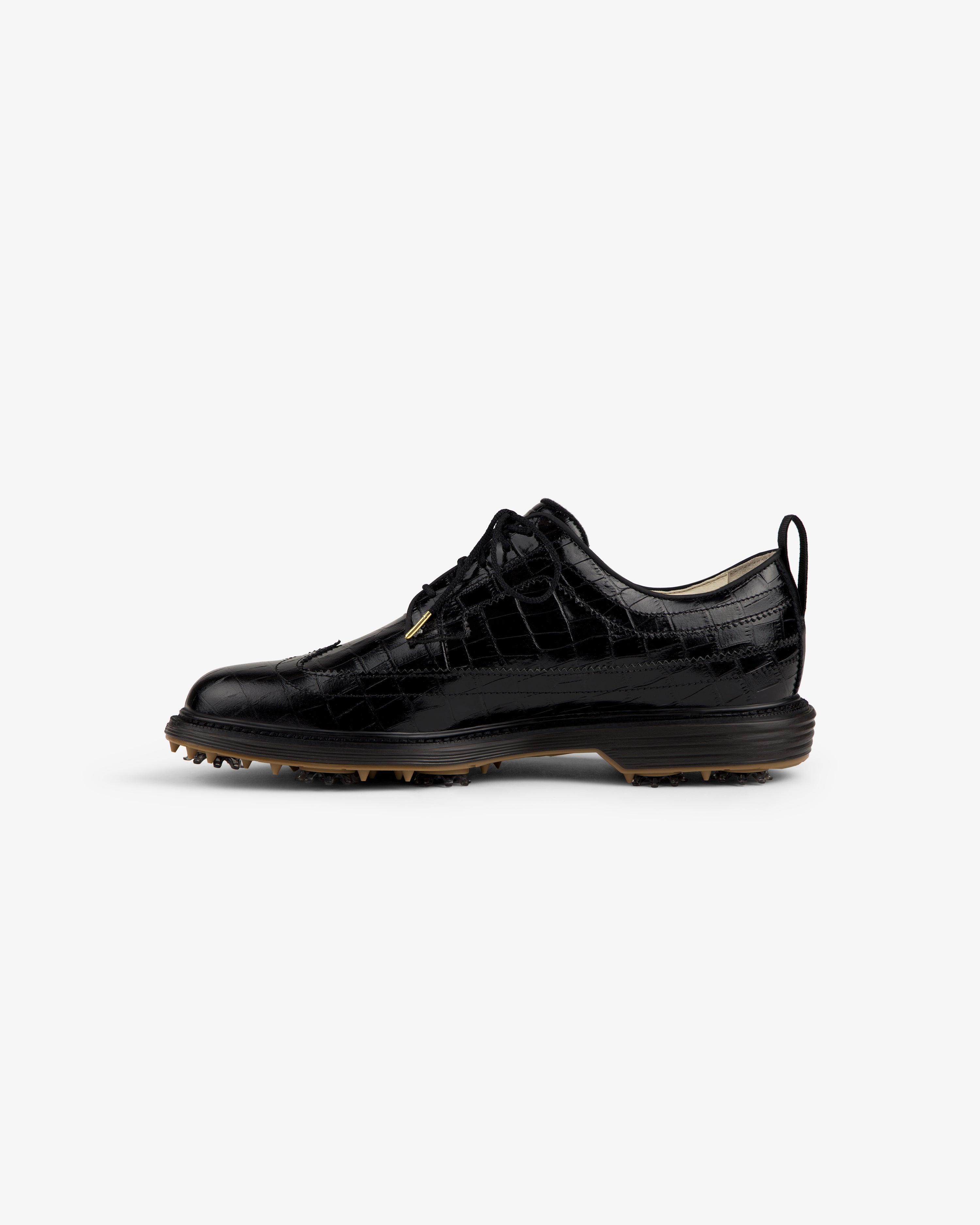 ALD / Footjoy Croc-Embossed Premiere Series Marquis: black leather golf shoe with laces and rubber spikes.