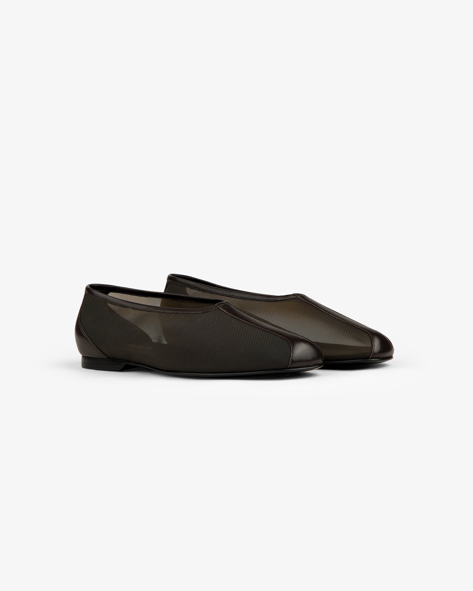 Mesh Ballet Flat: black slip-on shoes with mesh and rounded toe, shown on a white background.