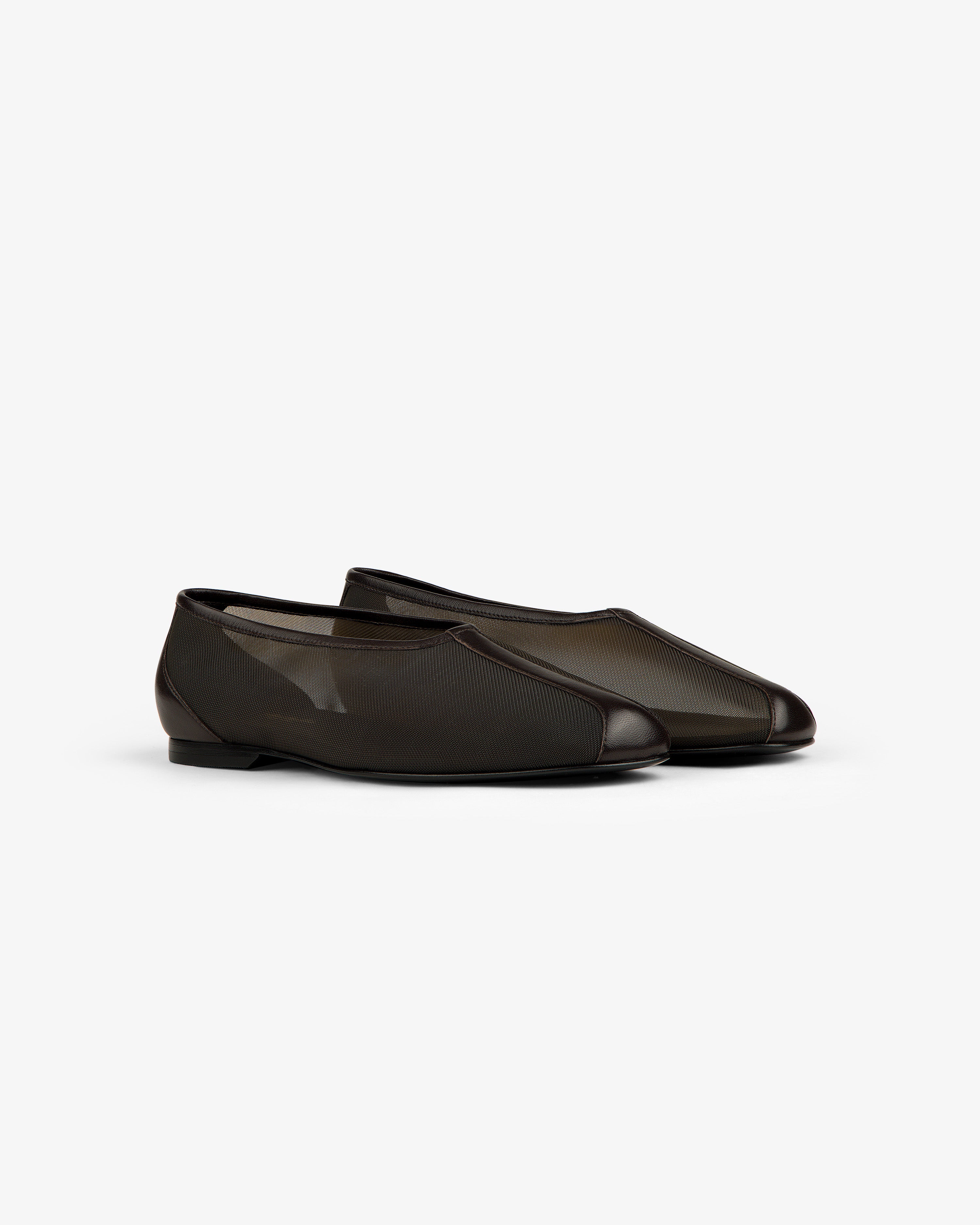 Mesh Ballet Flat: black slip-on shoes with mesh and rounded toe, shown on a white background.