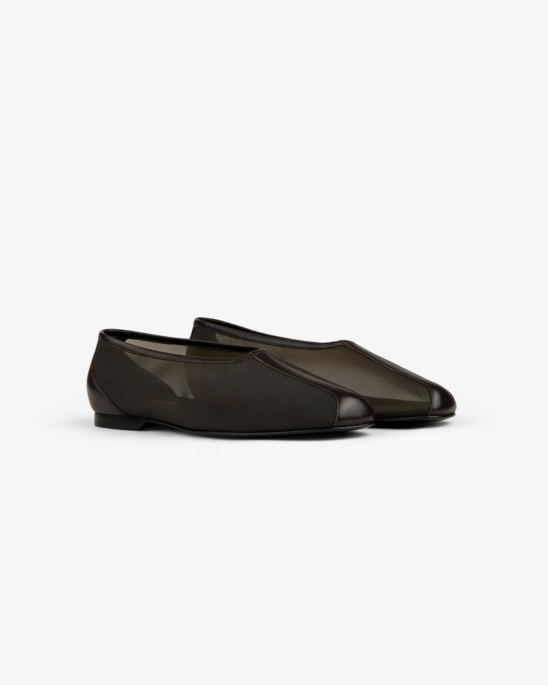 Mesh Ballet Flat: black slip-on shoes with mesh and rounded toe, shown on a white background.