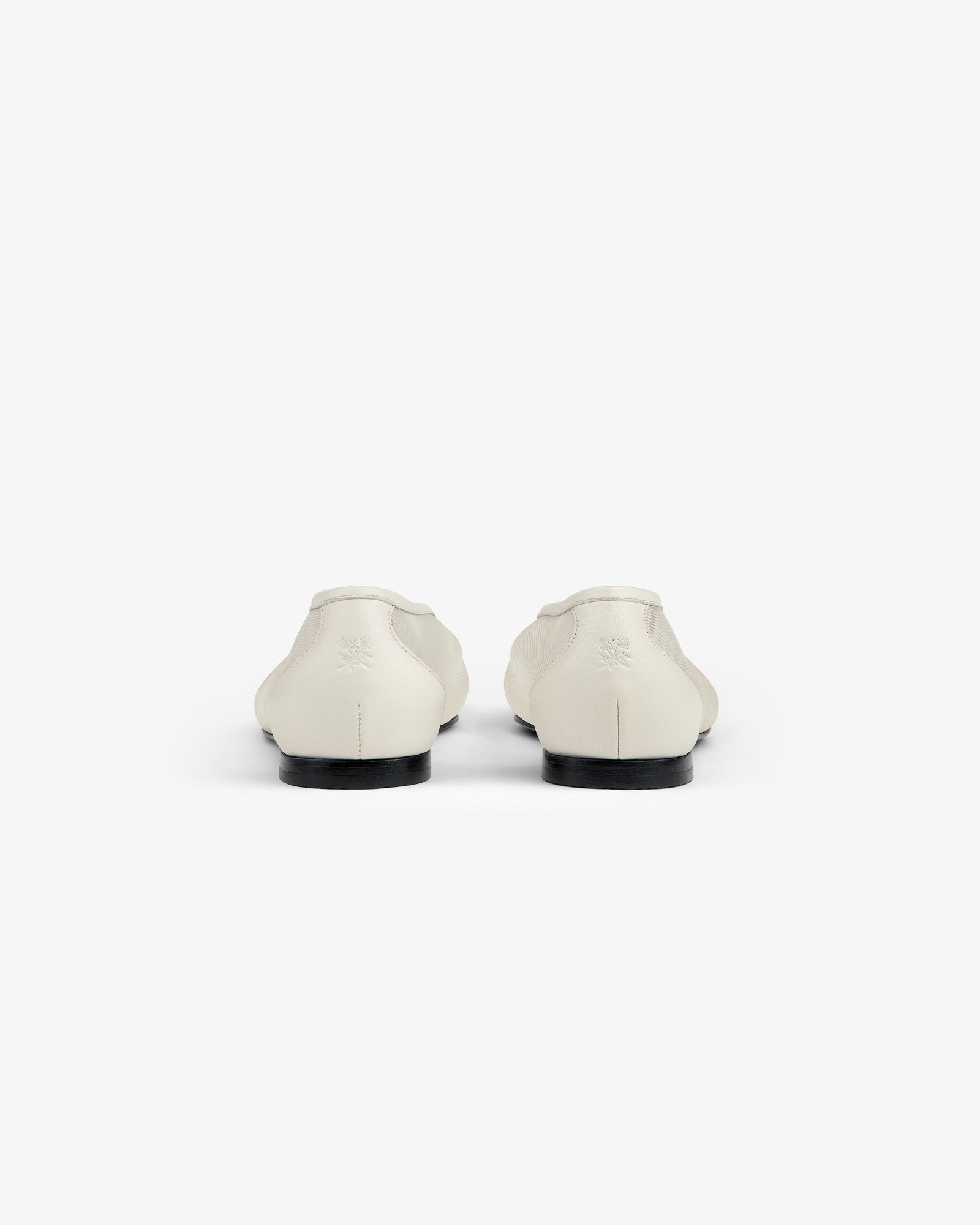 A pair of white Mesh Ballet Flats seen from the back against a plain white background.