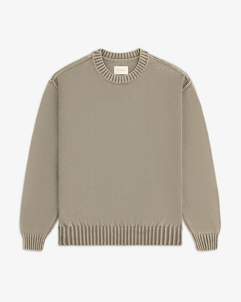Washed Inside Out Sweater in beige with ribbed collar, cuffs, and hem, laid flat on a white background.