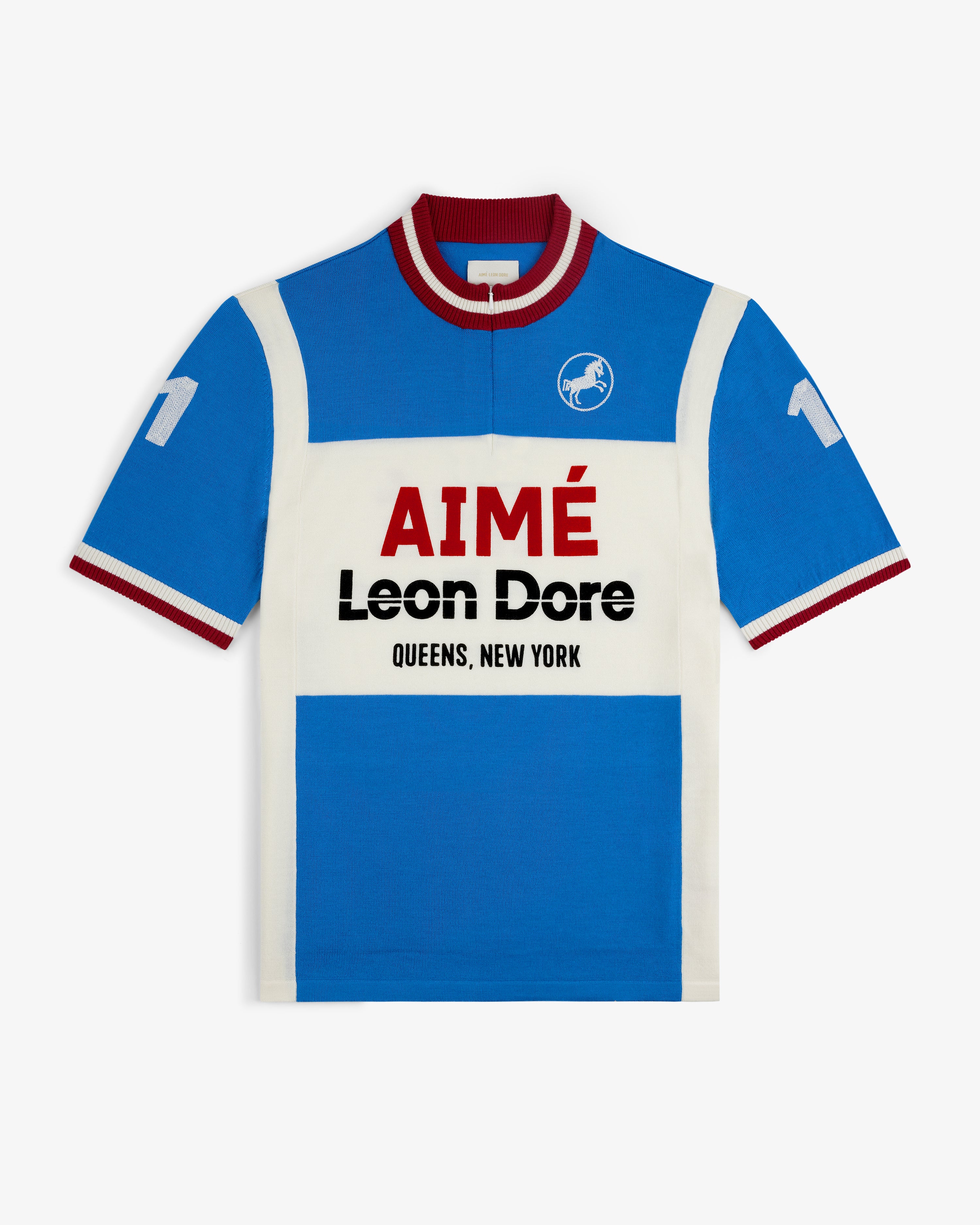 Blue and white Merino Wool Cycling Jersey with AIMÉ Leon Dore text and number 11 on sleeves.