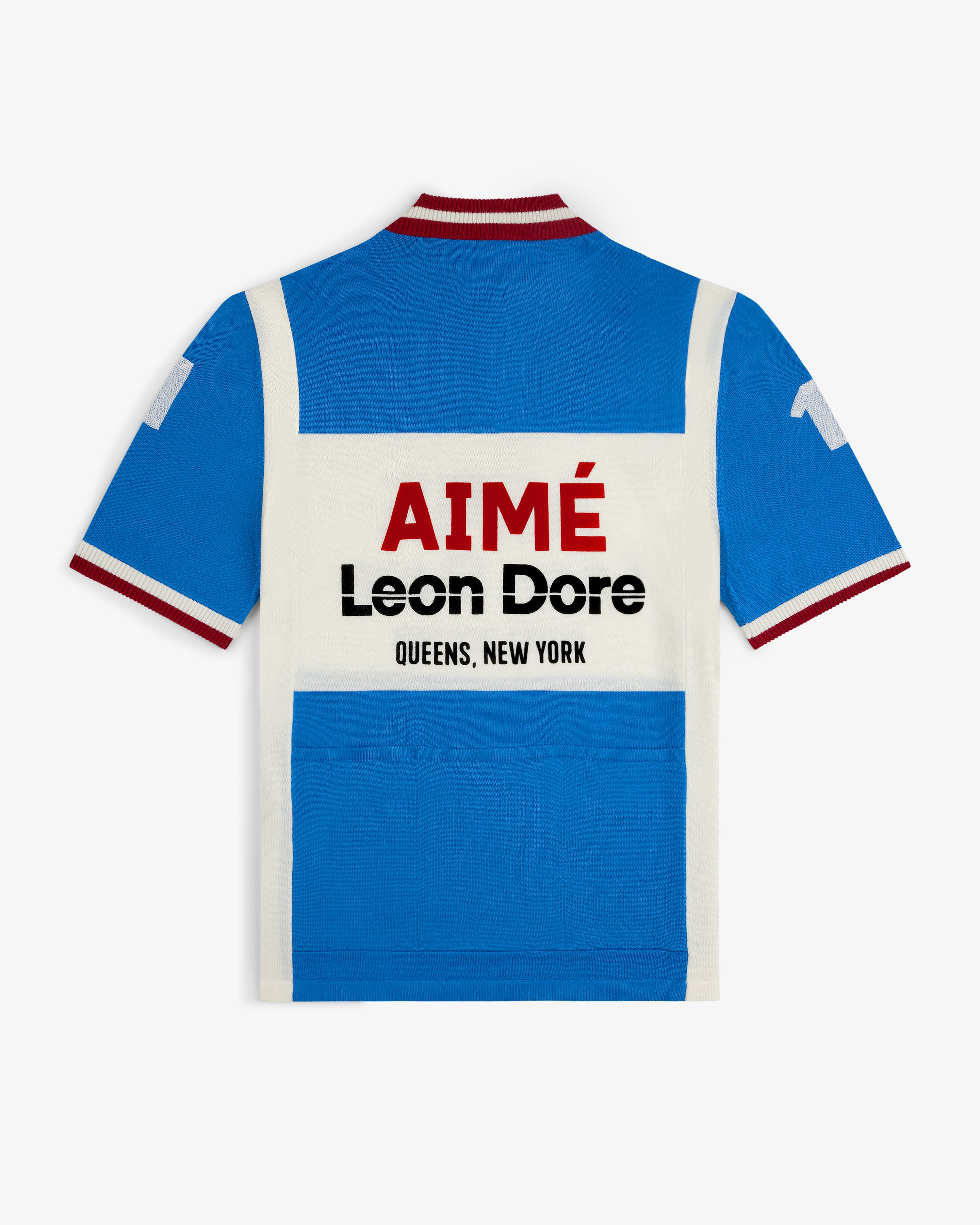 Blue and white Merino Wool Cycling Jersey with AIMÉ Leon Dore QUEENS, NEW YORK on the back.