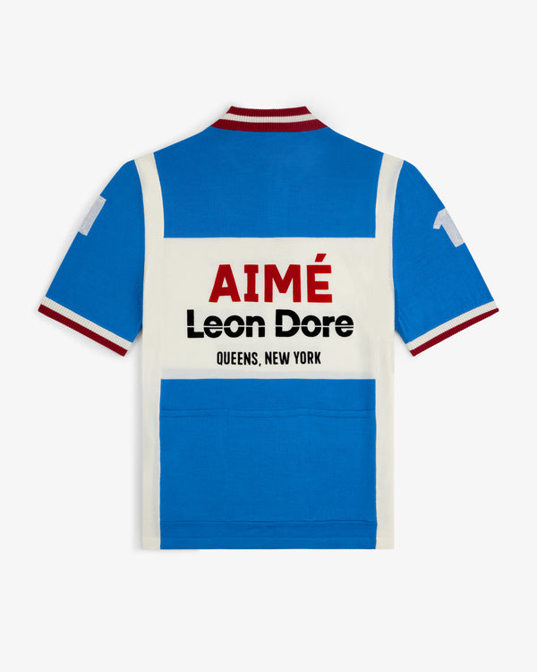 Blue and white Merino Wool Cycling Jersey with AIMÉ Leon Dore QUEENS, NEW YORK on the back.