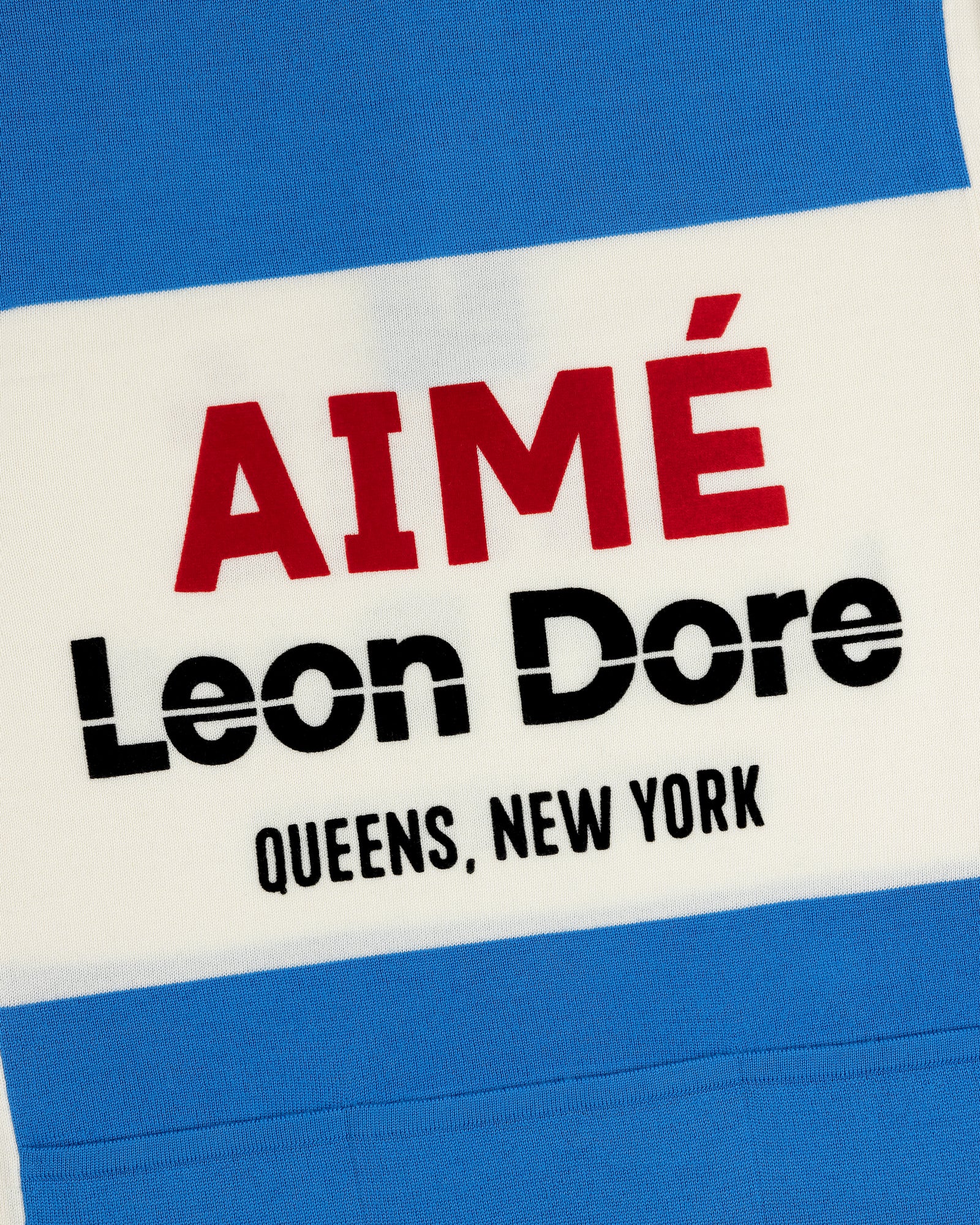 Blue and white Merino Wool Cycling Jersey with AIMÉ Leon Dore QUEENS, NEW YORK print.