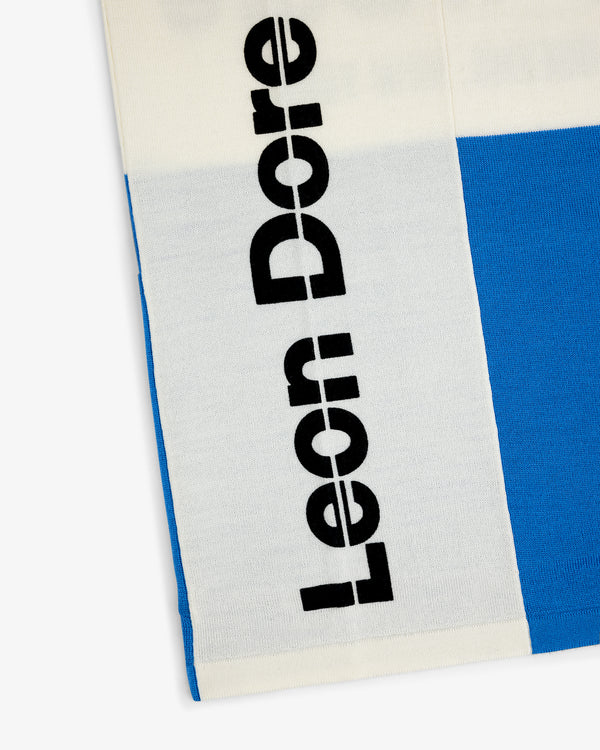 White and blue Merino Wool Cycling Jersey with bold black Leon Dore text vertically.