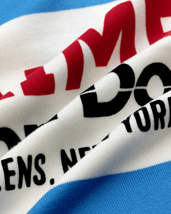 Close-up of Merino Wool Cycling Jersey with bold red and black NEW YORK text on stripes.