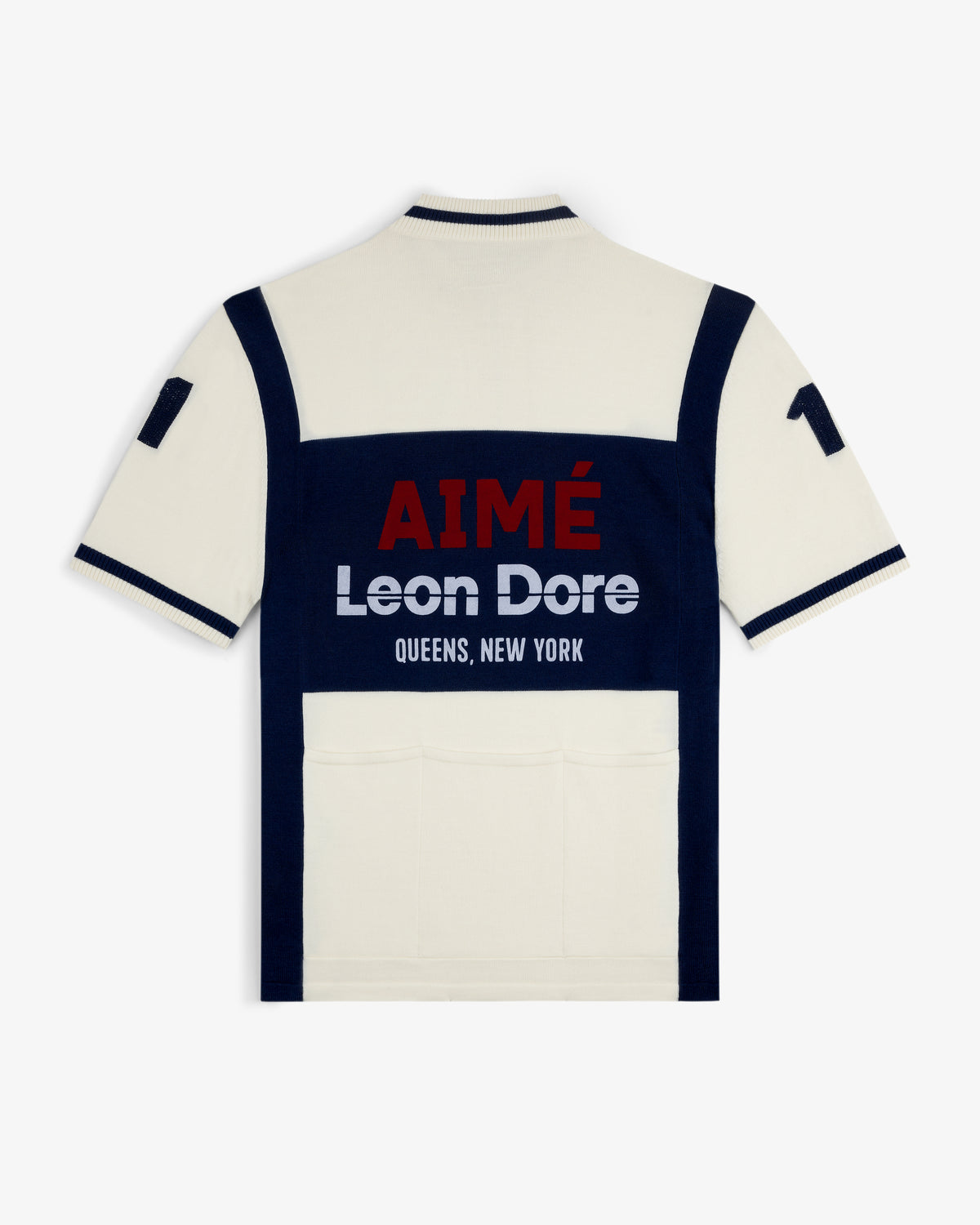 Back of a Merino Wool Cycling Jersey in cream and navy with AIMÉ Leon Dore QUEENS, NEW YORK and 17 on the sleeve.
