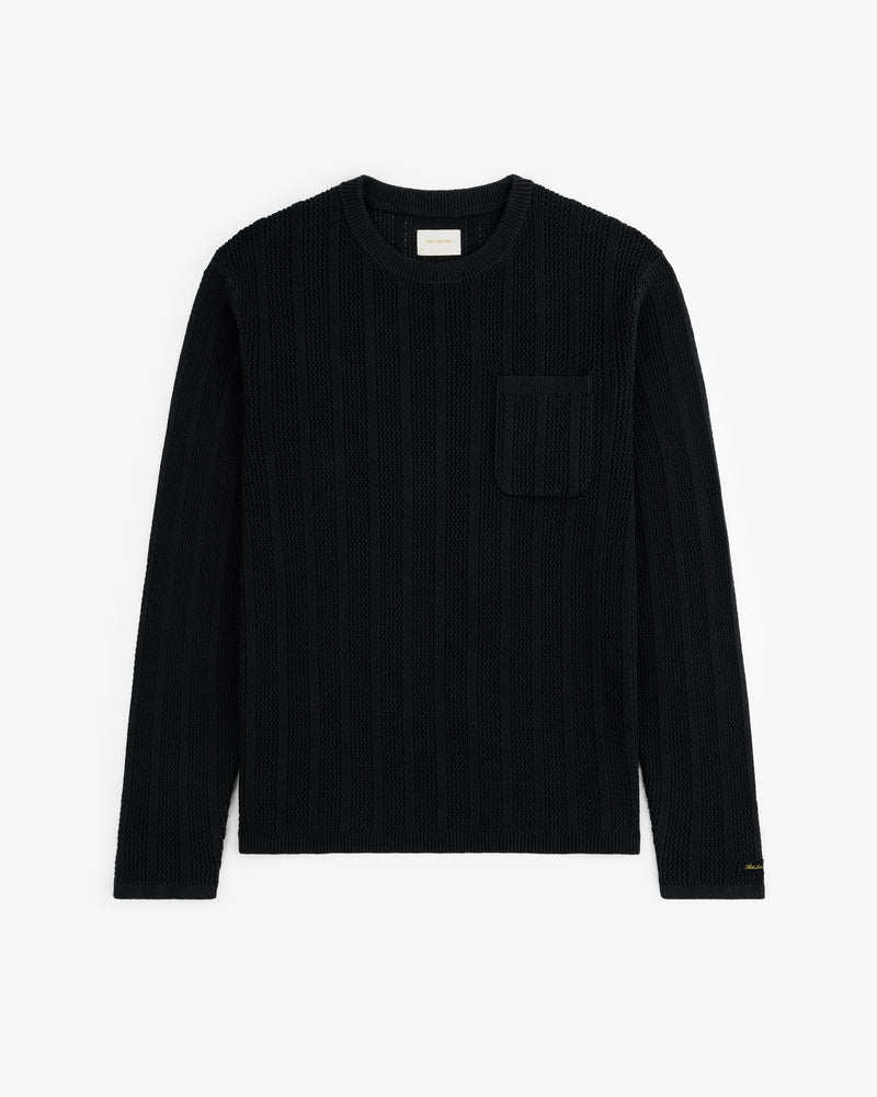 The Racking Stitch Crewneck Sweater in black with long sleeves and chest pocket, shown flat on a white background.