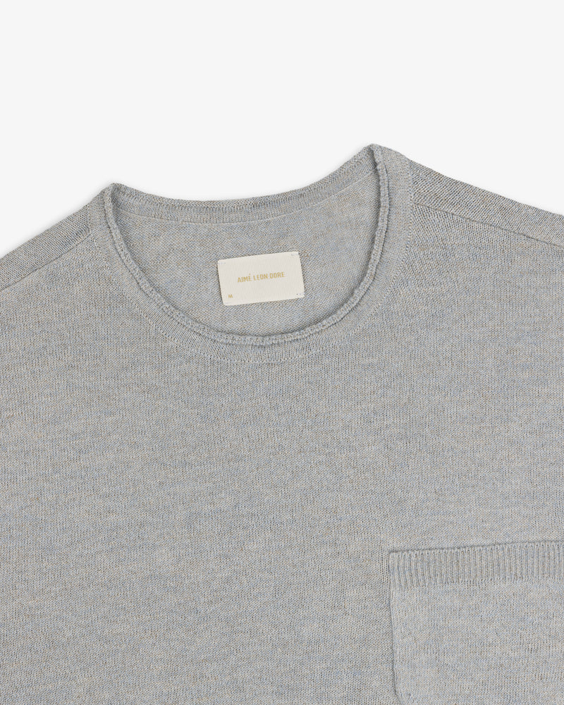 Long-Sleeve Knit Pocket Tee in light gray, crewneck style with chest pocket, displayed on a white background.
